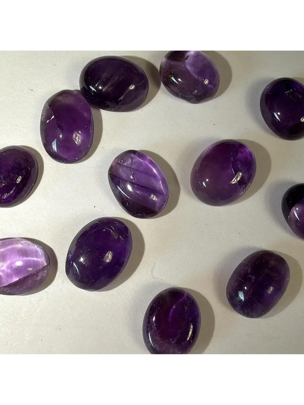 GEMS Set of 12 Polished Natural Amethyst Cabochon Shape Gemstones